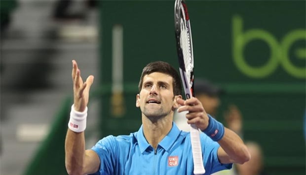 Novak Djokovic celebrates after beating Fernando Verdasco in their semi-final of the Qatar Exxon Mobil Open in Doha on Friday.