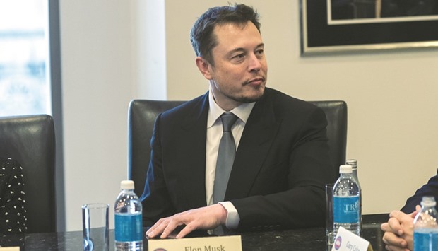 Elon Musk, CEO and co-founder of Tesla Motors, listens during a meeting with US president-elect Donald Trump and technology leaders at Trump Tower in New York on December 14. The Institute for Energy Research and its advocacy arm, the American Energy Alliance, have derided Musk as taking advantage of government support to build his business.