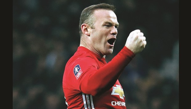 Manchester Unitedu2019s Wayne Rooney celebrates after scoring a goal against Reading yesterday. (Reuters)