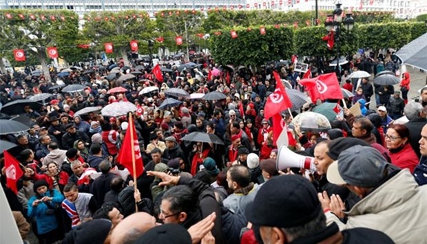 Tunisians demonstrate against the return of jihadists fighting for extremist groups abroad, on Habib Bourguiba Avenue in Tunis on Sunday.