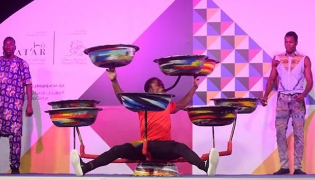 An acrobatic act at Hyatt Plaza, which is hosting a daily African Circus.