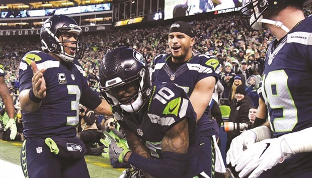 Seattle Seahawks wide receiver Paul Richardson (No 10) celebrates with quarterback Russell Wilson (No 3) his touchdown scored against the Detroit Lions at CenturyLink Field. PICTURE: USA TODAY Sports