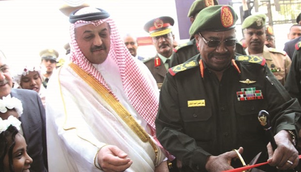 Sudanese President Omar al-Bashir and HE the Minister of State for Defence Affairs Dr Khalid bin Mohamed al-Attiyah inaugurating the new phase of Sur military and civilian clothing factory yesterday.