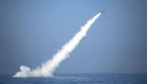 A Pakistani nuclear-capable cruise missile is pictured after being launched from a submarine during a test firing at an undisclosed location in Pakistan.