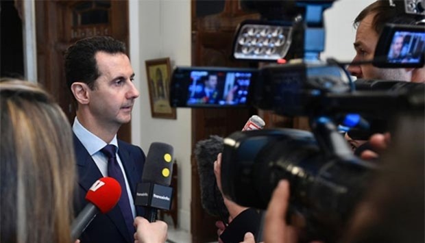 Syrian President Bashar al-Assad speaks to the French media in Damascus on Sunday.