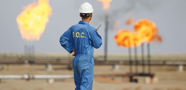 An Iraqi labourer at an oil refinery in the southern town Nasiriyah (file). Shipments from southern ports in Basra Province averaged 3.51mn bpd in December, Oil Minister Jabbar al-Luaibi said yesterday.