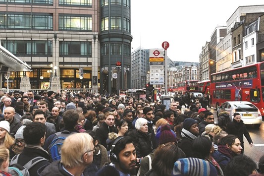 There were chaotic scenes outside Liverpool Street station yesterday morning as thousands tried to board packed buses.