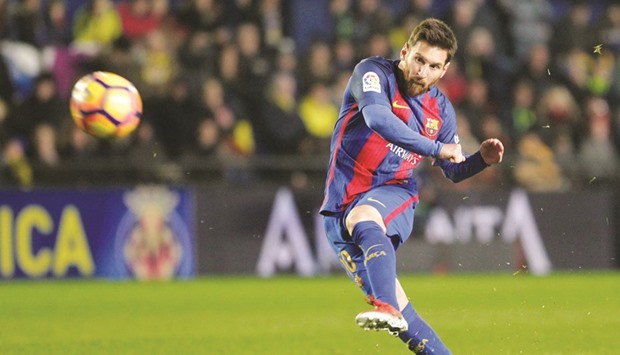 Lionel Messi finally broke Villarrealu2019s resistance as he stepped up to arrow a free-kick perfectly into the top corner. (Reuters)
