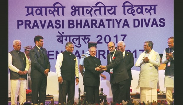 Doha Bank CEO Dr R Seetharaman receiving the Pravasi Bharatiya Samman Award from the President of India, Pranab Mukherjee, yesterday.