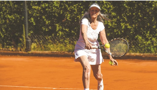 Senior tennis player Ana Obarrio, 83, hits the ball during a tennis match in Hurlingham, Buenos Aires.