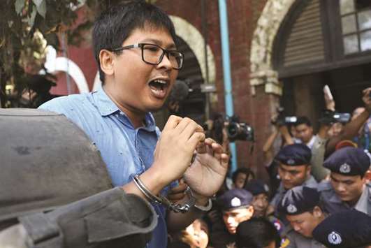 Reuters journalist Wa Lone arrives at the court in Yangon, Myanmar, yesterday.