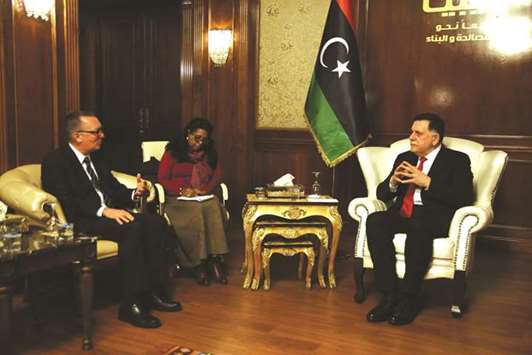 Libyau2019s unity government Prime Minister Fayez al-Sarraj meets with UN Undersecretary-General for Political Affairs Jeffrey Feltman (left) in the capital Tripoli, yesterday.