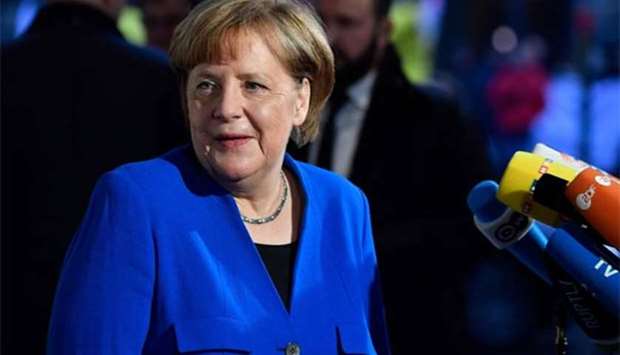 German Chancellor and Christian Democratic Union leader Angela Merkel arrives for talks with the leaders of the Social Democrats (SPD) on forming a new government in Berlin on Thursday.