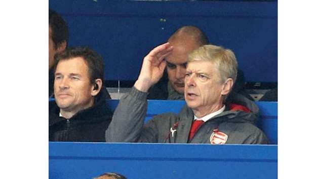 Manager Arsene Wenger (right) and his assistant Jens Lehmann sat in the press box at Stamford Bridge during Arsenalu2019s 0-0 draw with Chelsea in League Cup on Wednesday. (Reuters)