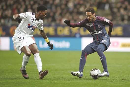 Paris Saint-Germainu2019s Neymar attempts to get past Amiensu2019 Serge during the French League quarter-finals. (Reuters)