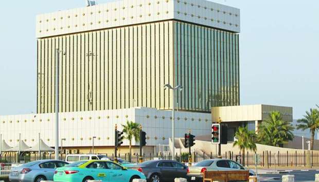 Cars drive past the QCB building in Doha (file).