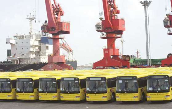 Buses wait to be exported in Lianyungang port. In December, Chinau2019s exports rose 10.9% from a year earlier, beating analystsu2019 forecast of a 9.1% increase, but cooling from a robust 12.3% gain in November, the General Administration of Customs said yesterday.