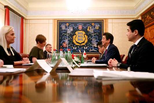 Estonian President Kersti Kaljulaid meets with Japanese Prime Minister Shinzo Abe in Tallinn, Estonia yesterday.