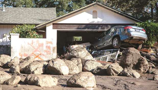 A house lies completely destroyed after the mudslide in Montecito, California.