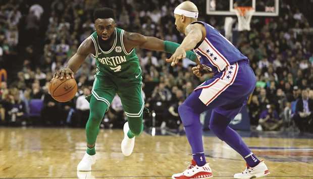 Boston Celticsu2019 Jaylen Brown (left) in action with Philadelphia 76ersu2019 Jerryd Bayless during their NBA game at the O2 Arena in London on Thursday. (Reuters)