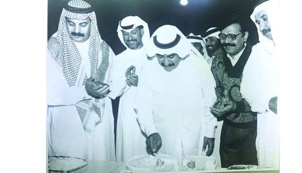 Abdulrehman Saif al-Madhadi cuts the cake with Mubarik Jiham al-Kuwari, Saif-ur-Rehman and Dr Hassan Rashid at an Urdu Radio function in 1995.
