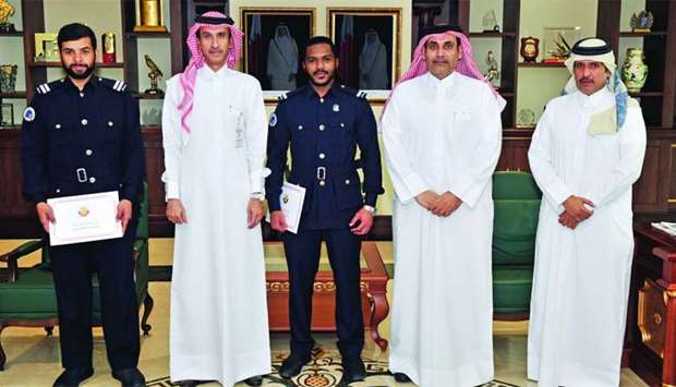 GAC officials with the employees honoured for their efforts