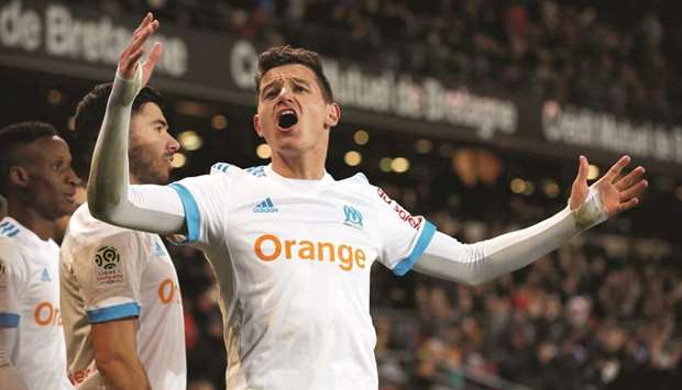 Marseilleu2019s Florian Thauvin celebrates scoring their third goal during the Ligue 1 match against Rennes at Roazhon Park in Rennes, France, yesterday. (Reuters)