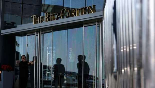 An entrance to Ritz-Carlton Hotel at International Commerce Centre, where the bodies of a woman and a boy were found and a man arrested, in Hong Kong on Sunday.