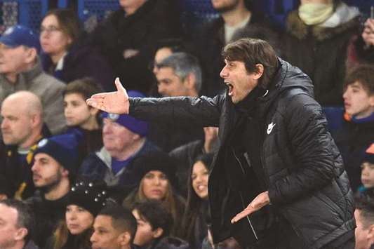 Conte reacts during Chelsea's match against Leicester on Saturday.