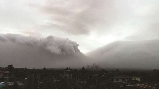 Mount Mayon erupts in Legazpi City, in this still image obtained from social media.