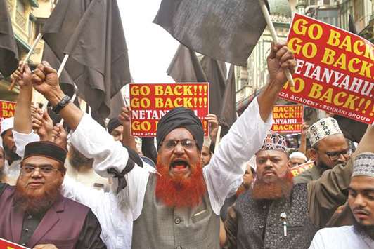 People shout slogans during a protest against the visit of Israeli Prime Minister Benjamin Netanyahu, in Mumbai yesterday.