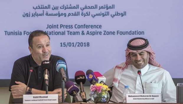 Tunisiau2019s national football coach Nabil Maaloul (left) and Mohammed Mubarak al-Kuwari, Chief Marketing Officer at AZF at a press conference at the Aspire Zone in Doha yesterday.
