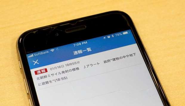 Japan's public broadcaster NHK's false alarm about a North Korean missile launch which was received on a smart phone is pictured in Tokyo
