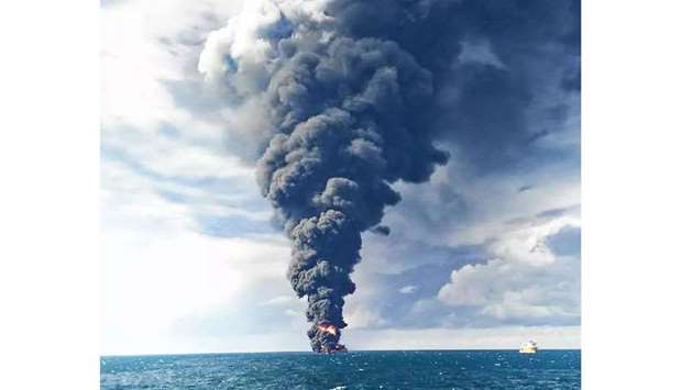 Smoke and flames coming from the sinking oil tanker u201cSanchiu201d at sea off the coast of eastern China.