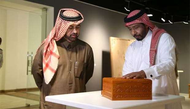 Katara general manager Dr Khalid bin Ibrahim al-Sulaiti being briefed about wood works. 