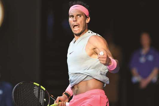 Spainu2019s Rafael Nadal celebrates a point during their menu2019s singles second round match against Argentinau2019s Leonardo Mayer on day three of the Australian Open in Melbourne yesterday. (AFP)