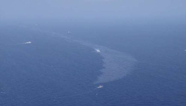The oil spill from a stricken Iranian tanker Sanchi that sank on Sunday is seen in the East China Sea.