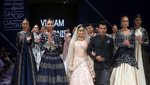 A Bollywood Fashion Show on Wednesday saw Bollywood star Kareena Kapoor walking the ramp with distinctive outfits by Indian celebrity designers.