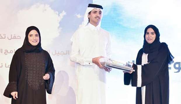 HE Sheikh Thani bin Hamad bin Khalifa al-Thani honouring a graduate of the ,Sama Nama, programme on Thursday.