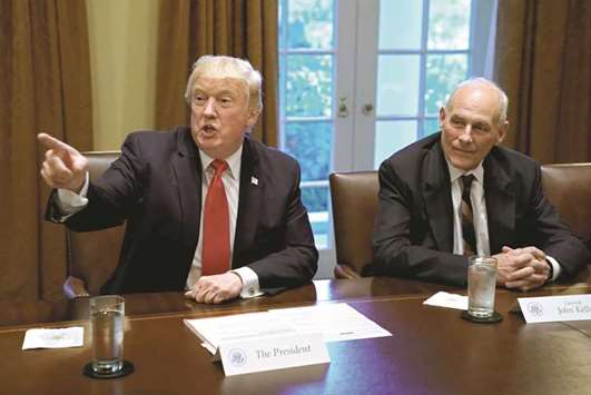 This picture taken on October 5 last year shows Trump with Kelly during a briefing with senior military leaders at the White House.
