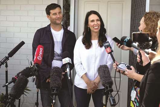 New Zealand Prime Minister Jacinda Ardern (right) and her partner Clarke Gayford announce to the press that they are expecting their first child, in Auckland.