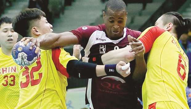 Action from the match between Qatar and China during the eighth Asian Menu2019s Handball Championship in Seoul, South Korea yesterday.