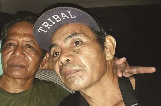 Two Indonesian men (names unavailable) who were freed after being held hostage for more than a year, in the town of Jolo, Sulu province on the southern island of Mindanao.