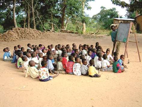 In some primary schools in Malawi, lessons have to be taught outside due to a lack of classrooms.