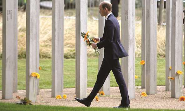 Prince William, pictured at the Hyde Park memorial to victims of the July 7, 2005 London bombings, has spoken about ending the stigma surrounding mental illness.