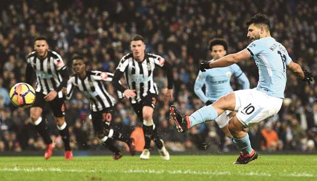 Manchester Cityu2019s Sergio Aguero (right) scores his second goal from the penalty spot during the English Premier League match against Newcastle United at the Etihad Stadium in Manchester. (AFP)