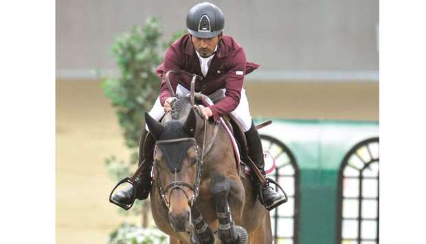 Awad al-Qahtani rides Cassander van het Bremhof to victory in the sixth leg of the Hathab equestrian series at Al Shaqab yesterday.