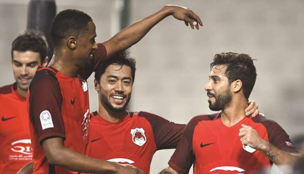 Al Rayyan players after scoring a goal against Al Kharaitiyat in the QNB Stars League. PICTURES: Noushad Thekkayil