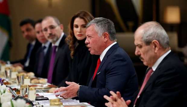 Jordan's King Abdullah and wife Queen Rania are seen during their meeting with US Vice President Mike Pence and wife Karen Pence (not pictured) at the Royal Palace in Amman