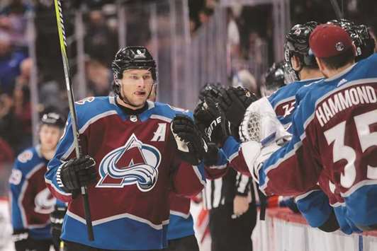 Colorado Avalanche defenseman Erik Johnson (left) celebrates with teammates after his goal in the first period of their NHL game against the New York Rangers at the Pepsi Centre. PICTURE: USA TODAY Sports